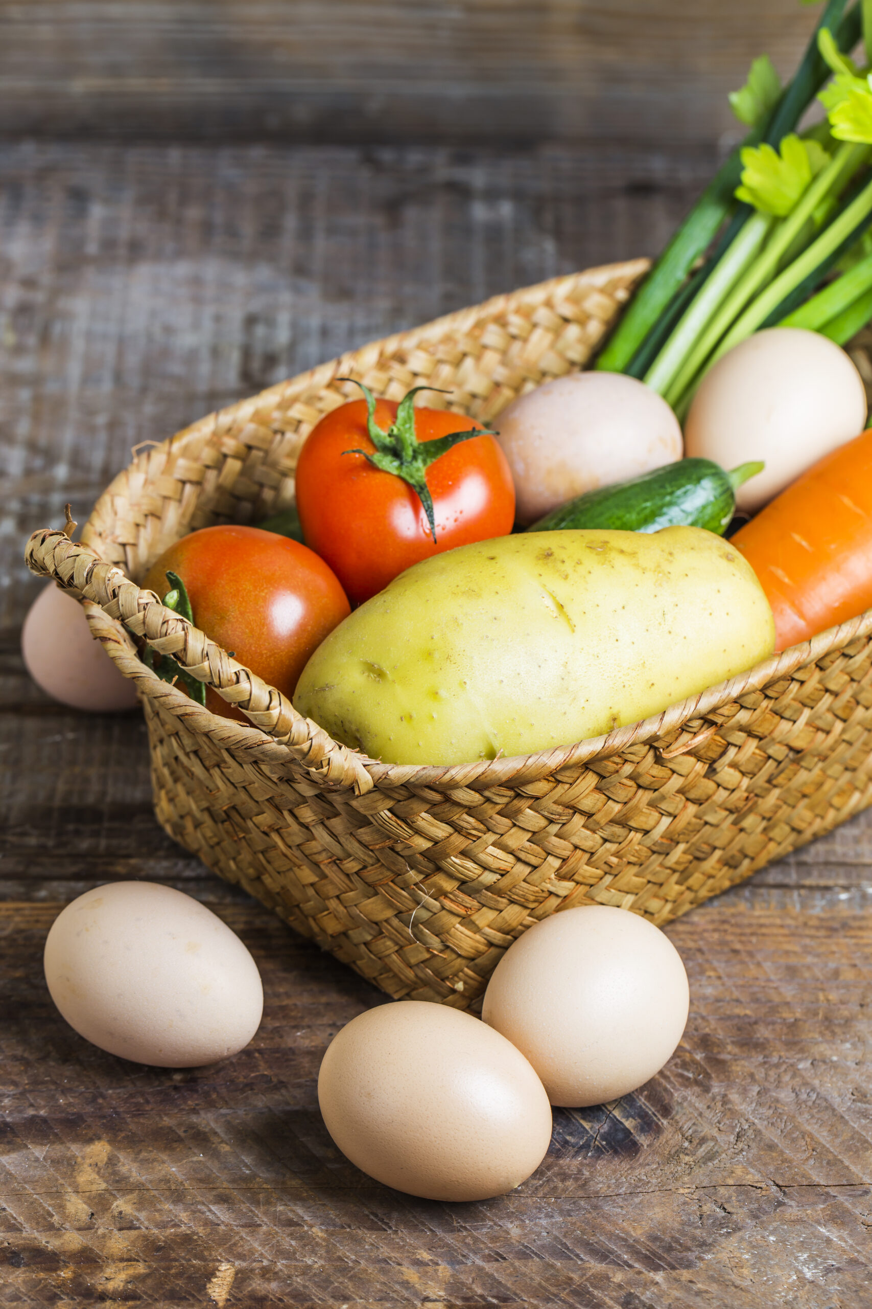 eggs-next-to-a-basket-with-vegetables